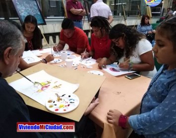 Joel Ramos en el Dia Munidal Pintor Boca y Pie